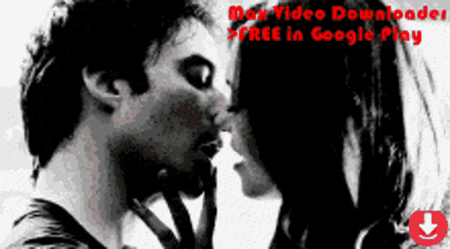 a black and white photo of a man and woman kissing with the words max video downloader free in google play on the bottom