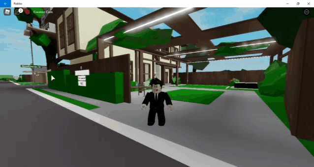 a roblox screen shows a man in a suit standing in front of a large house