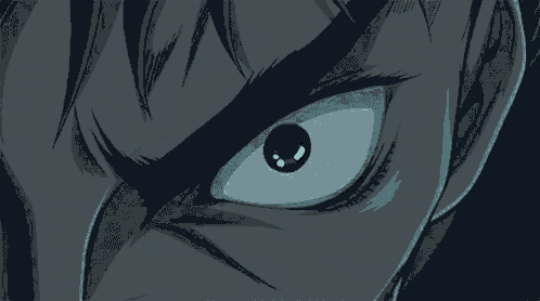 a close up of a blue and white object with a dark background