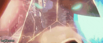 a close up of a person wearing a helmet in a video game with a blue light coming out of it .