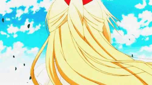 a girl with long blonde hair is wearing a red hat .