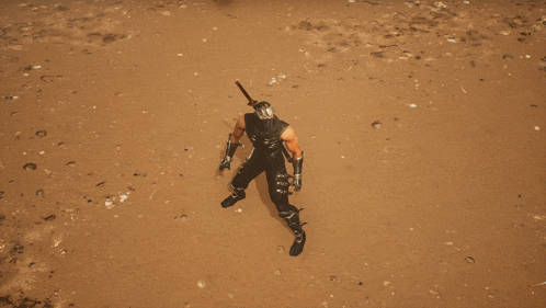 a man in a ninja costume is holding a sword in his right hand
