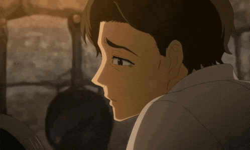 a close up of a girl 's face with large blue eyes