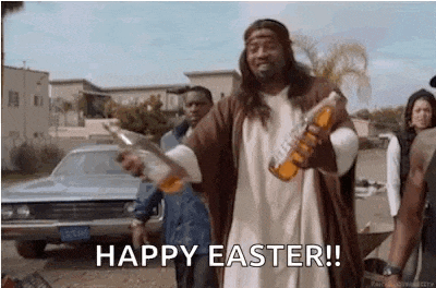 a man dressed as jesus is holding a bottle of orange juice and a gun .