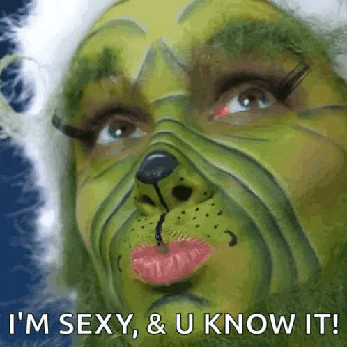 a picture of a woman dressed as the grinch with the words " i 'm sexy & u know it "