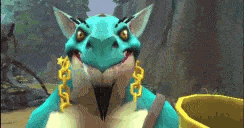 a blue and white monster with gold chains around its neck is standing next to a yellow cup .