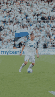 a soccer player wearing a jersey that says unibet on the front