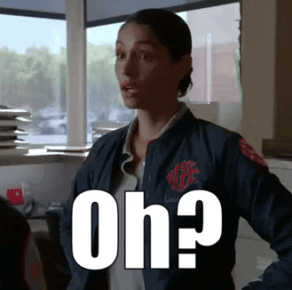 a woman in a bomber jacket says oh