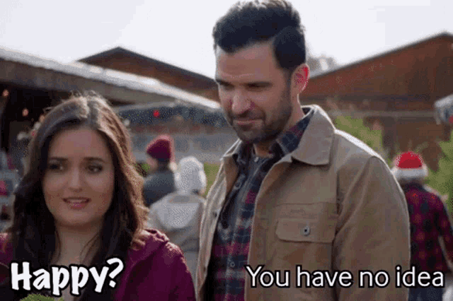 a man and a woman are standing next to each other and the man says " happy " and the woman says " you have no idea "
