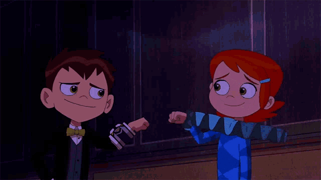 a boy and a girl are standing next to each other and the girl is wearing a blue dress