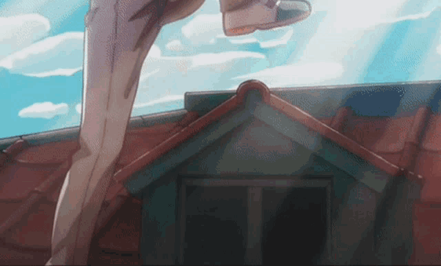 a person is standing on a roof with their feet up in the air