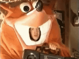 a man in a crash bandicoot costume is holding a camera