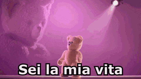 a teddy bear is standing in front of a purple background with the words `` sei la mia vita '' .