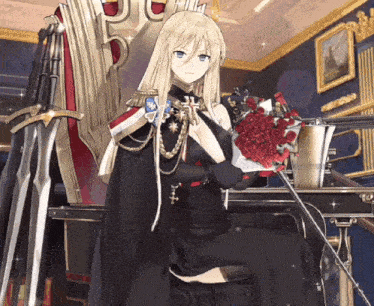 a woman in a black dress is holding a bouquet of roses