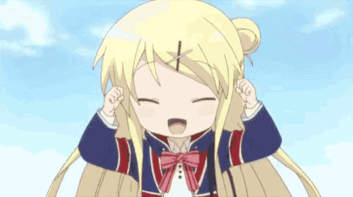 a girl with blonde hair and a red and blue jacket has her arms up in the air