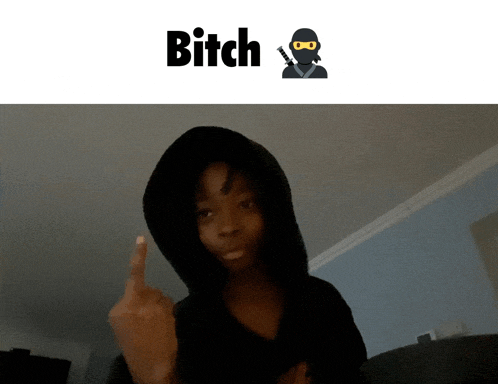 a person wearing a black hoodie giving the middle finger with the word bitch below them