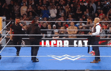 a wrestling ring with a sign that says jacor cat