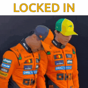 two men wearing orange jackets and hats are standing next to each other with the words locked in above them