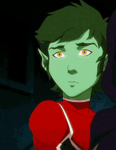 a cartoon character with green hair and yellow eyes is wearing a red top