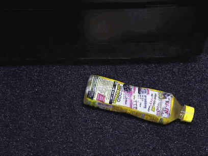 a yellow bottle with a label that says lemonade on it