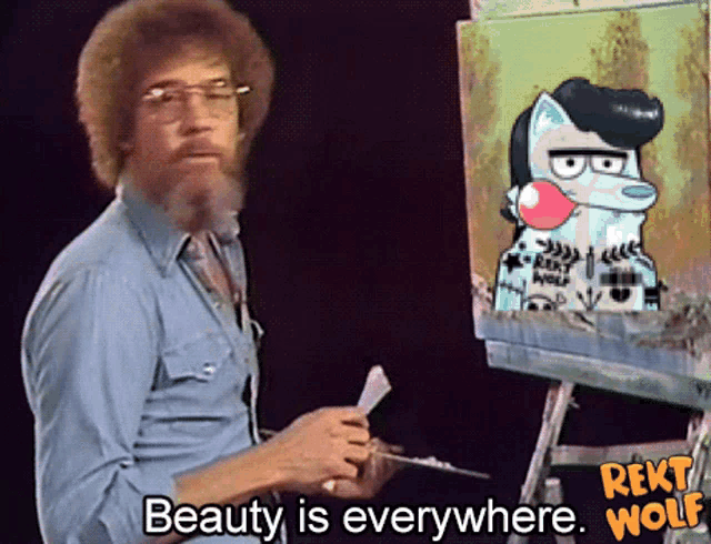 a man painting a picture of a wolf with the words beauty is everywhere