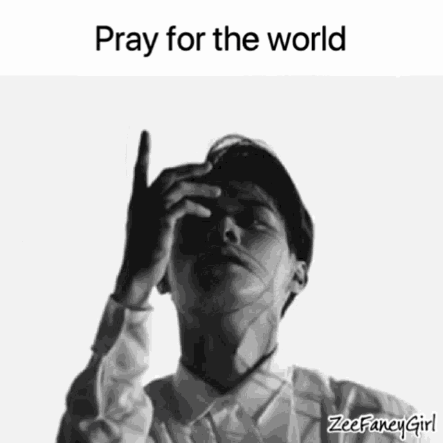 a black and white photo of a man with the words pray for the world