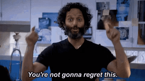 a man with curly hair and a beard is saying you 're not gonna regret this .