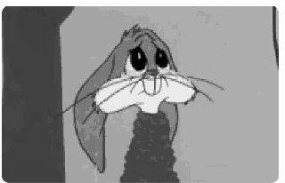 bugs bunny from looney tunes is standing next to a wall in a black and white cartoon .