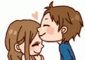 a boy is kissing a girl on the forehead .