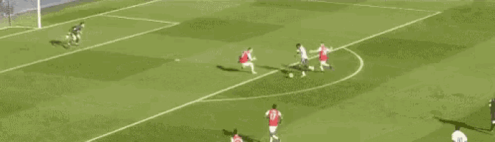 a group of soccer players are playing on a field with a banner behind them that says live up to £ 400 on our holidays