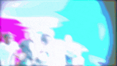a blurry picture of a group of people standing in front of a blue sky
