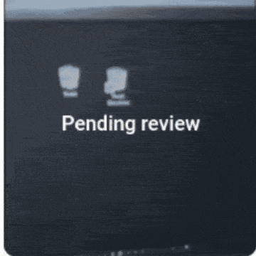 a computer monitor with the word pending review on it