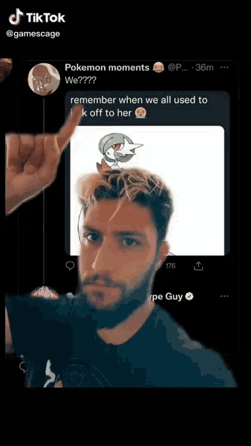 a man with a beard is pointing at a picture of a pokemon on his head