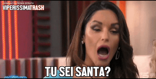 a woman with her mouth open and the words tu sei santa