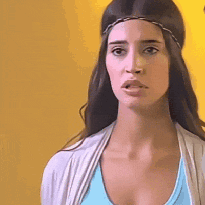 a woman wearing a headband and a blue tank top