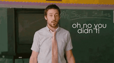 a man in a tie is standing in front of a blackboard and says oh no you didn 't .