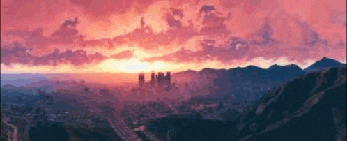 a sunset over a city with mountains in the foreground and a city in the background