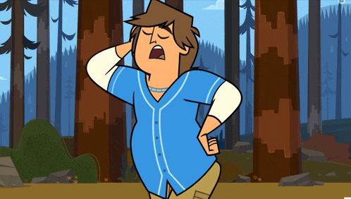 a man in a blue shirt is standing in a forest with his mouth open
