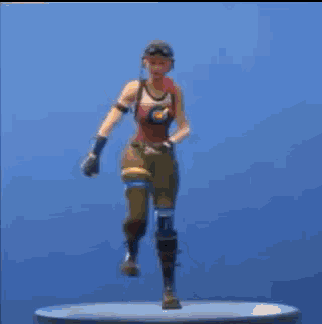 a cartoon character with a pumpkin head is dancing on a table .