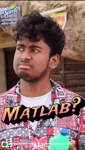 a man is holding a bottle of sprite and has the word matlab on his face