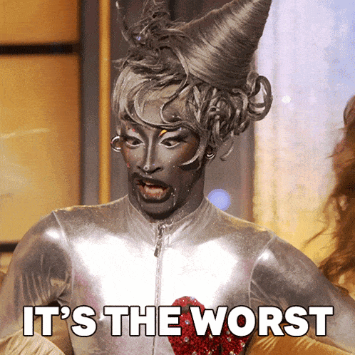 a drag queen says it 's the worst while wearing a silver costume