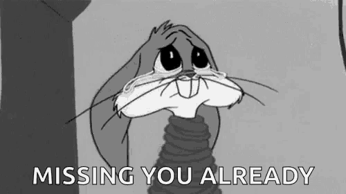 bugs bunny is crying in a black and white cartoon and the words `` missing you already '' are written below him .