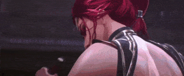 a group of women with red hair are standing next to each other in a room .