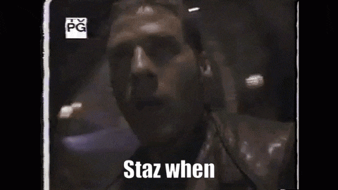 a close up of a man 's face with the words ' staz when ' written on it .