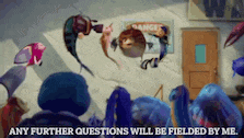 a group of people are watching a cartoon with the words " any further questions will be fielded by me "