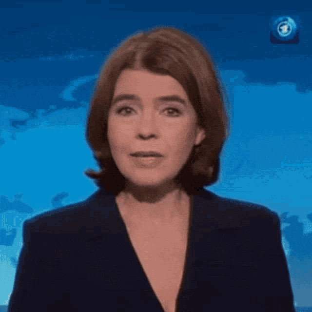 a female news anchor says mittwoch in front of a blue background