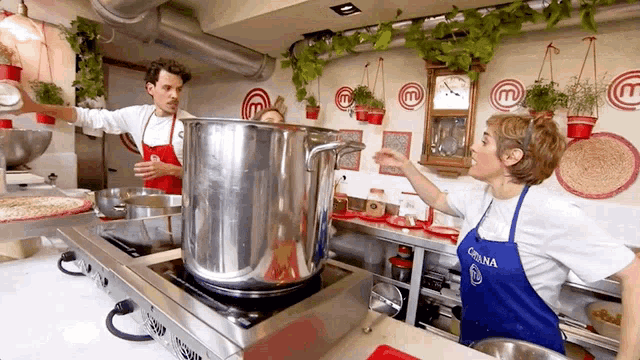 a woman wearing a blue apron that says grana