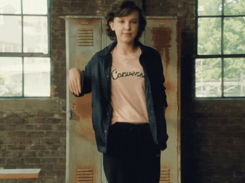 Millie Bobby Brown Waving GIF - Millie Bobby Brown Waving Back To School GIFs