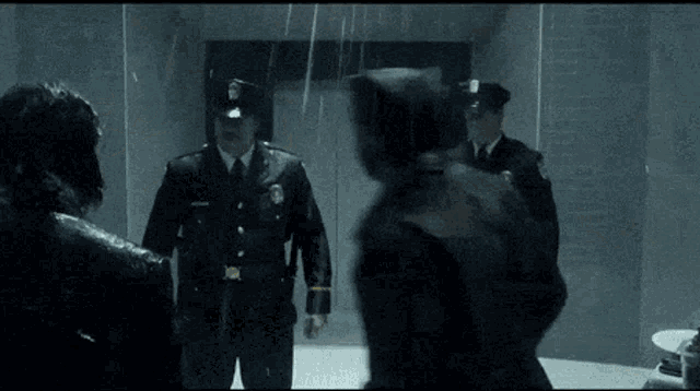 a police officer with a badge that says ' n.y.p.d. '