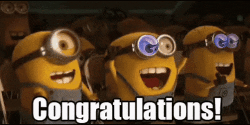 a group of minions are standing next to each other and congratulating each other .